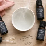 Rhume et huiles essentielles : flacons d’eucalyptus, ravintsara et tea tree pour voies respiratoires